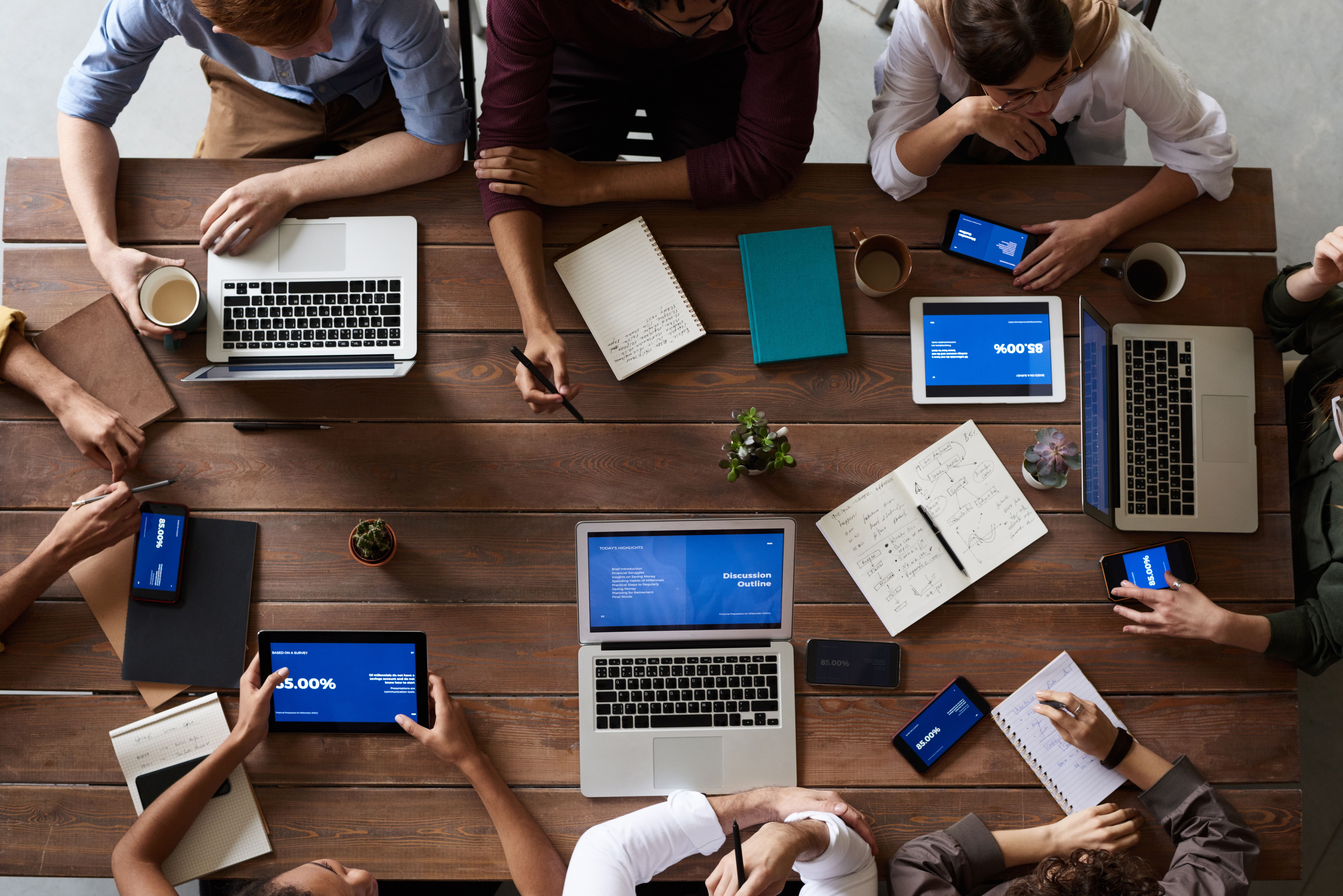 Team collaborating at a large table